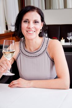 happy smiling couple in restaurant celebrate toast champagne dinner