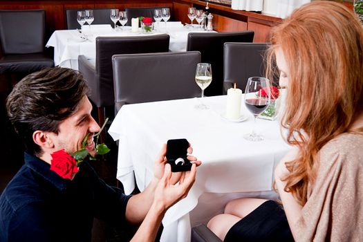 happy couple in restaurant romantic date love dinner valentines day wedding