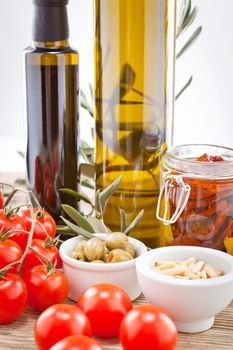 tatsty geen olives tomatoes and olive oil ingredients vegetarian food