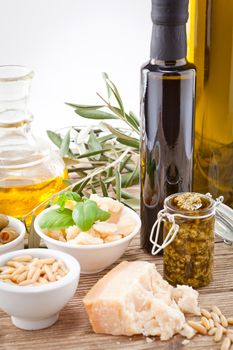 tatsty geen olives parmesan and olive oil ingredients vegetarian food