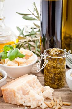 tatsty geen olives parmesan and olive oil ingredients vegetarian food