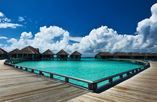 Beautiful beach with water bungalows at Maldives