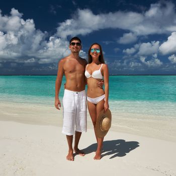 Couple on a tropical beach at Maldives