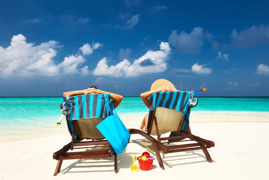 Couple on a tropical beach at Maldives