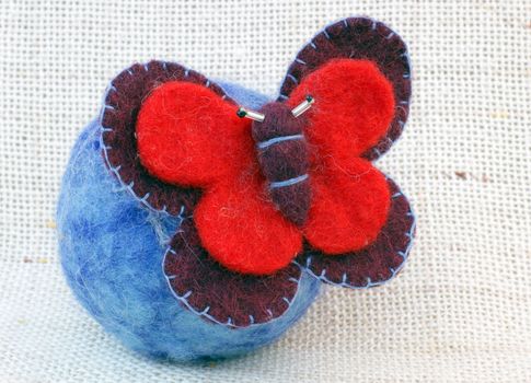 Needle felting butterfly brooch on the needle felting ball