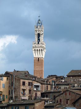 Siena - panorama of the old part of town with a slender tower, Torre del Manga