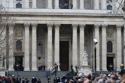 London, UK. April 17th, 2013. The crowd waits for Baroness Thatcher funeral procession on Ludgate Hill.