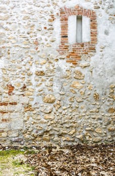 stone and brick background with a fake window