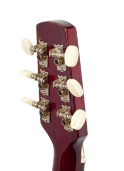 Headstock of the guitar over white background 