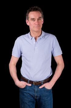 Happy Smiling Middle Age Man with Hands in Pockets Relaxed Black Background
