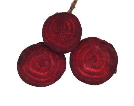 sliced red beets isolated on white background 