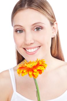 Young happy woman holding gerbera flower isolated on white background.