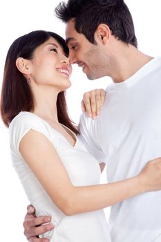 Portrait of diverse young couple isolated on white background.