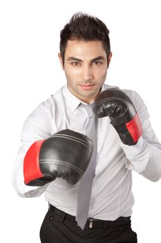Young businessman  wearing boxing gloves isolated on white background.