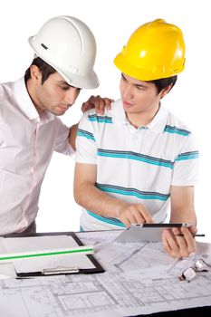 Two architects using digital tablet at work isolated on white background.