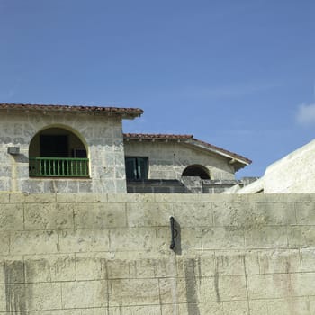 Old tropical villa made of stone blocks