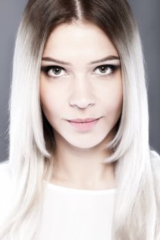 portrait of attractive caucasian girl with shiny blond hair