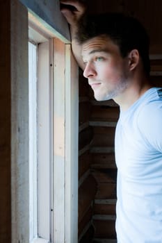 Young man at the window