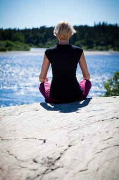 Yoga in nature with a young girl