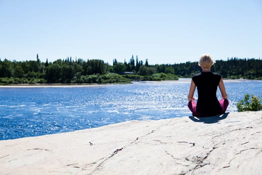 Yoga in nature with a young girl