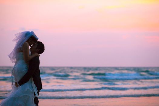 happiness and romantic Scene of love couples partners wedding on the Beach