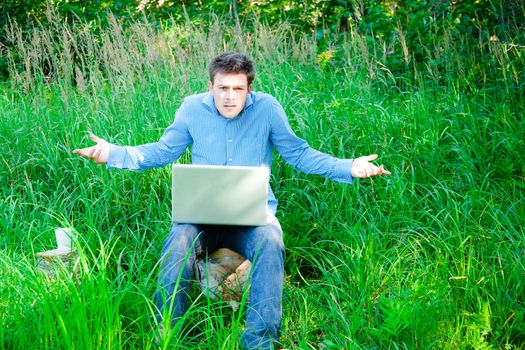 incomprehension of a man lost in nature with technology