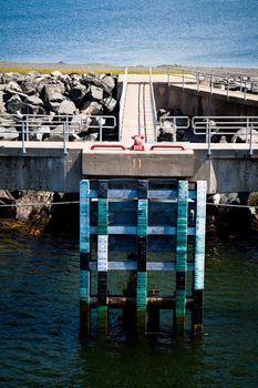 View of pier and the port on a sunny day of summer