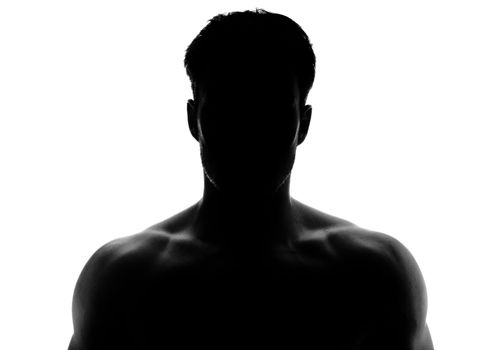 Muscular silhouette of a young man - misterious face