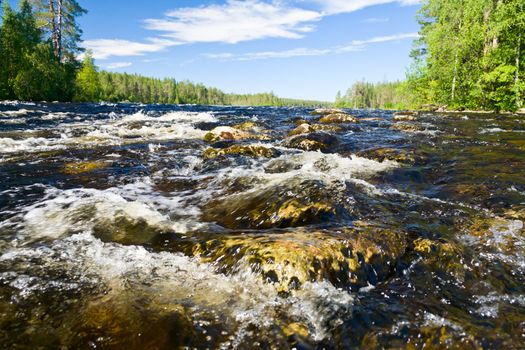 Close-up shot of rapids on the Pistojoki river in Karelia, Russia