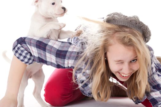 Young girl having a great time with the puppies