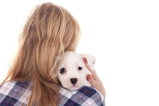 Young girl having a great time with the puppies