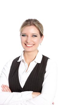 An attractive smiling blond haired business woman with her arms folded.