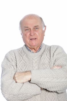 Portrait of mature, balding man, dressed in a knit, cable sweater