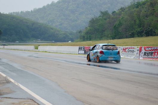 Nakhon Ratchasima, Thailand - March 9th:Unidentified car racing competitors during the "Thailand circuit 2013  " at Bonanza speedway on March 9th, 2013 in Nakhon Ratchasima, Thailand. 