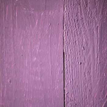 Background texture of painted purple wooden planks with a rough surface and woodgrain detail, square format