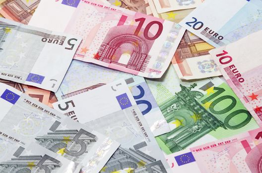 Money background (Euro banknotes on a table), close up image