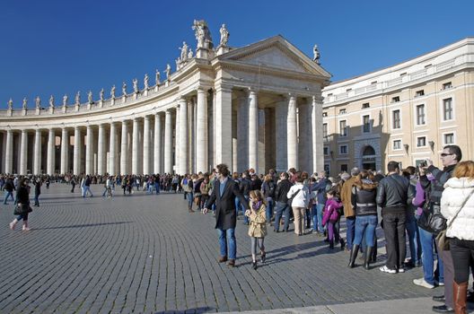 ROME, ITALY - MARCH 07: Tourists in Saint Peter's Square (Italian: Piazza San Pietro) on March 07, 2011 in Rome, Italy