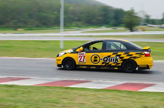Nakhon Ratchasima, Thailand - March 9th:Unidentified car racing competitors during the "Thailand circuit 2013  " at Bonanza speedway on March 9th, 2013 in Nakhon Ratchasima, Thailand. 