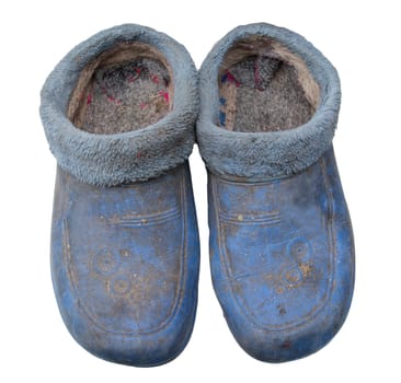 dirty galoshes on a white background