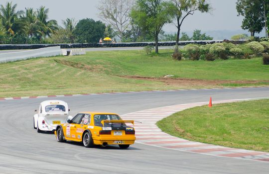 Nakhon Ratchasima, Thailand - March 9th:Unidentified car racing competitors during the "Thailand circuit 2013  " at Bonanza speedway on March 9th, 2013 in Nakhon Ratchasima, Thailand. 