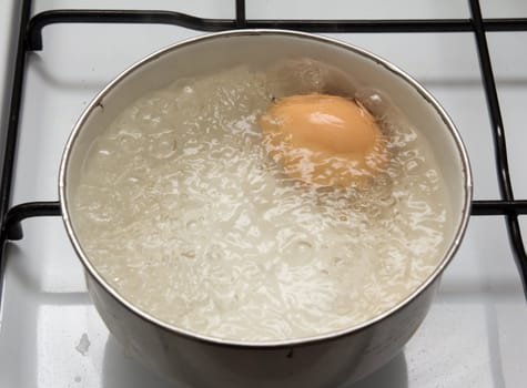 egg is cooked in a pan