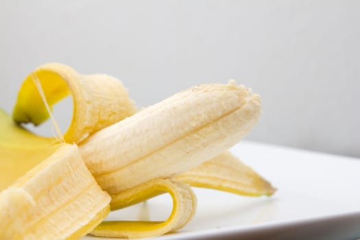 Close up of fresh banana over white background 