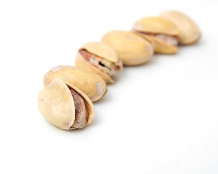 Pistachios on a white background