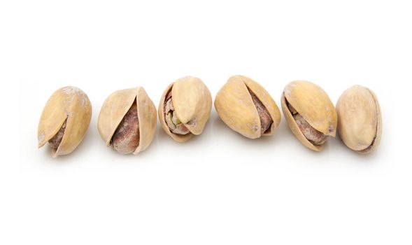 Pistachios on a white background