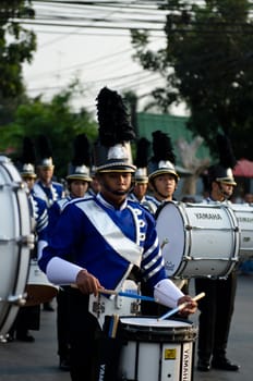 Phetchaburi, Thailand - March 28th:participants in Phranakhonkhiri festival parade 2013 on public street in front of Khao Wang  Phetchaburi on March 28th, 2013 in Phetchaburi Province, Thailand. 