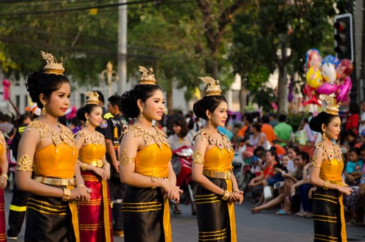 Phetchaburi, Thailand - March 28th:participants in Phranakhonkhiri festival parade 2013 on public street in front of Khao Wang  Phetchaburi on March 28th, 2013 in Phetchaburi Province, Thailand. 