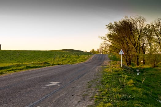   Road on a decline of day