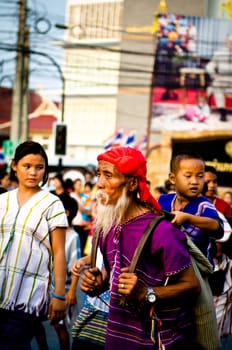 Phetchaburi, Thailand - March 28th:participants in Phranakhonkhiri festival parade 2013 on public street in front of Khao Wang  Phetchaburi on March 28th, 2013 in Phetchaburi Province, Thailand. 