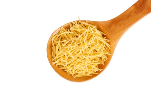pasta in a wooden spoon isolated on a white background