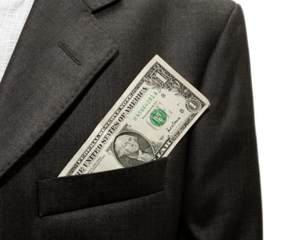 dollars in the pocket of a jacket